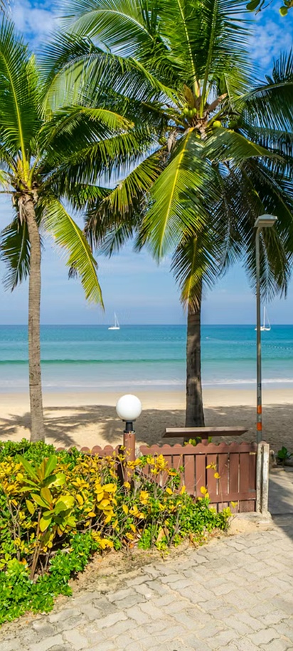 a scenic view of Kamala Beach in Phuket, Thailand