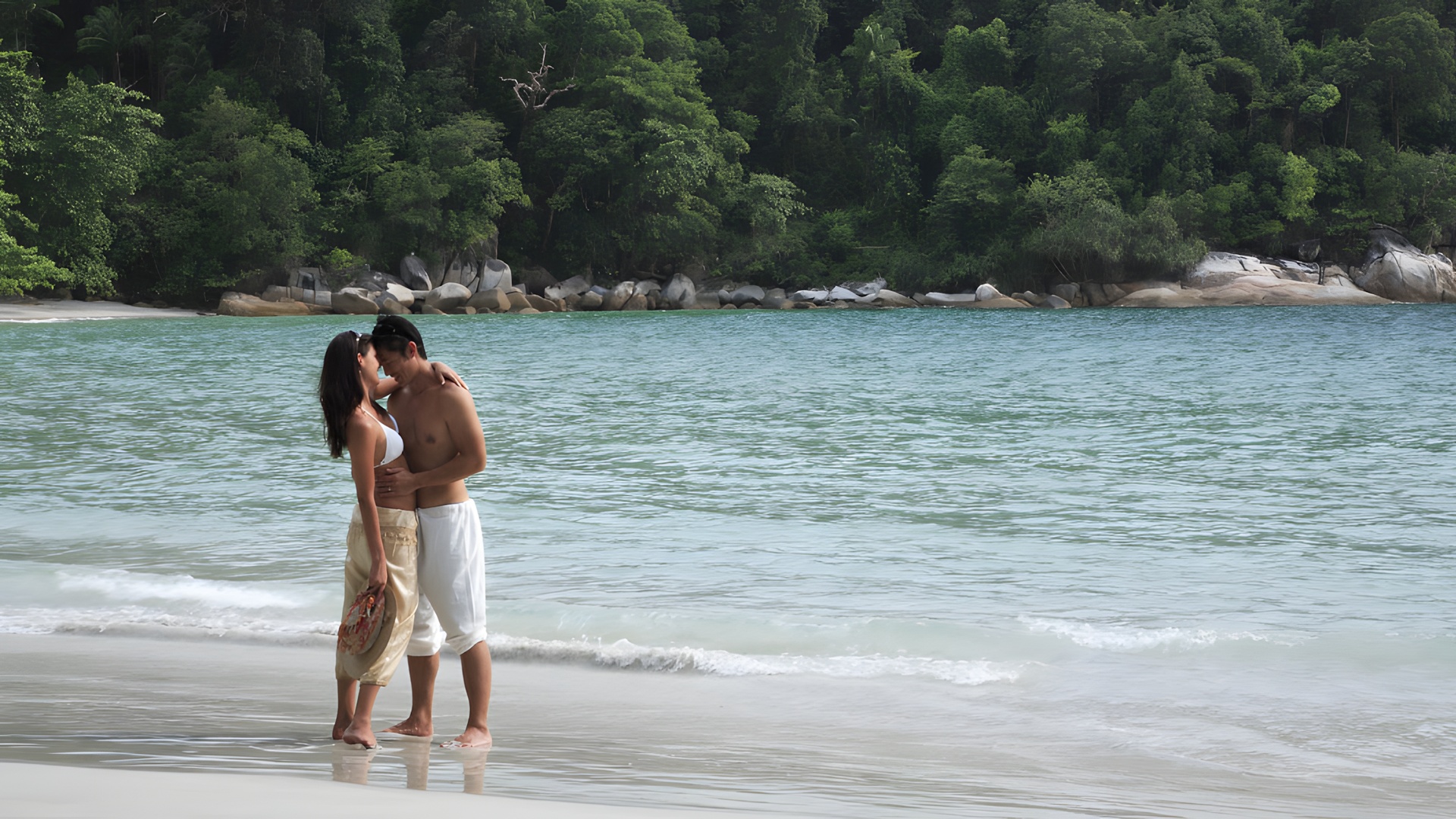 couple on the beach at Pangkor Laut Resort