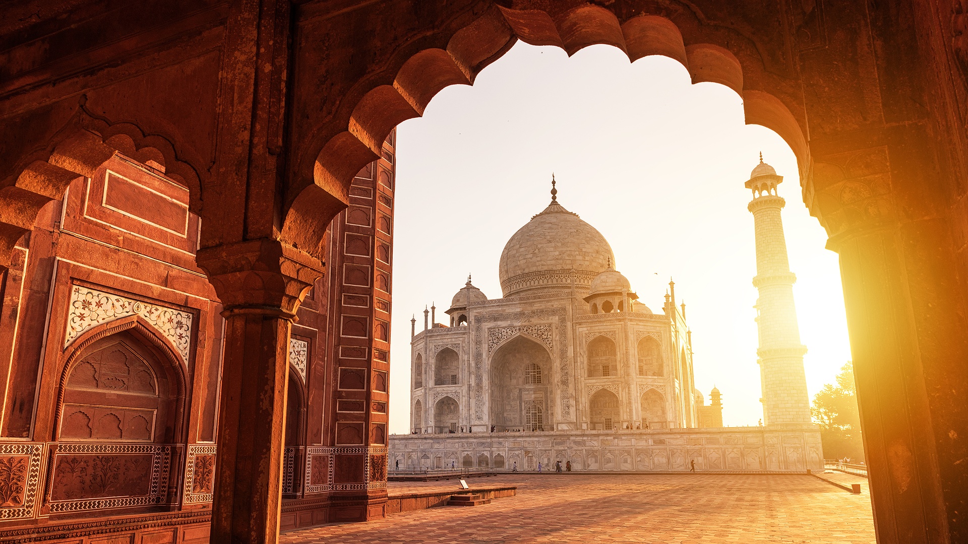the Taj Mahal, a famous ivory-white marble mausoleum located in Agra, India