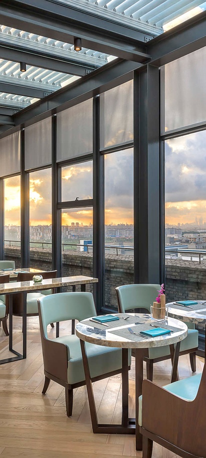 rooftop lounge or restaurant area within the Novotel Shanghai Clover hotel