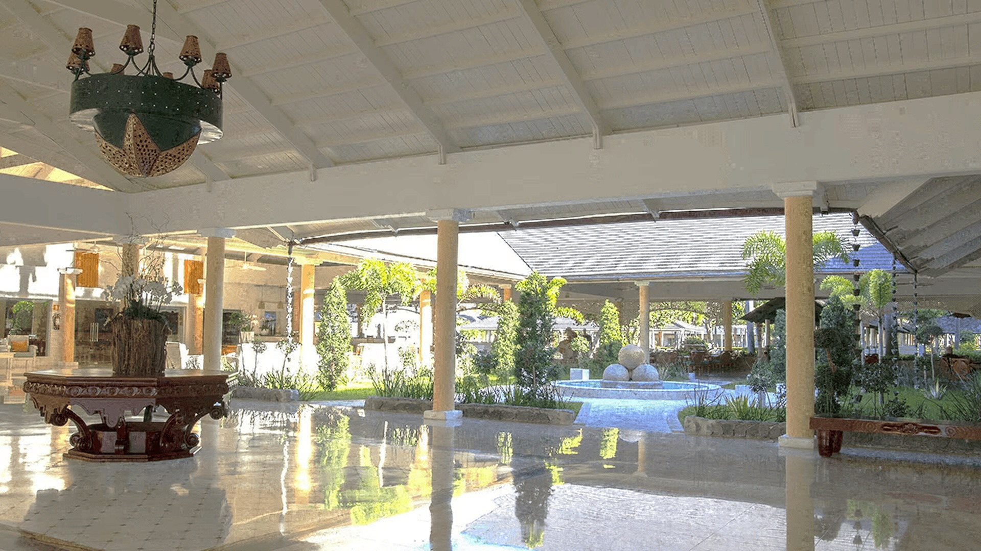 the open-air lobby of the Iberostar Waves Punta Cana, a 5-star all-inclusive resort located on Bavaro Beach in the Dominican Republic