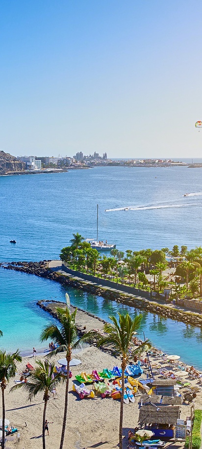 a scenic view of Anfi del Mar beach on the island of Gran Canaria, Spain