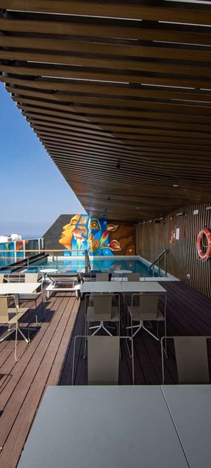 the 18th-floor Garden Rooftop terrace and swimming pool area at the Hilton Garden Inn Lima Miraflores
