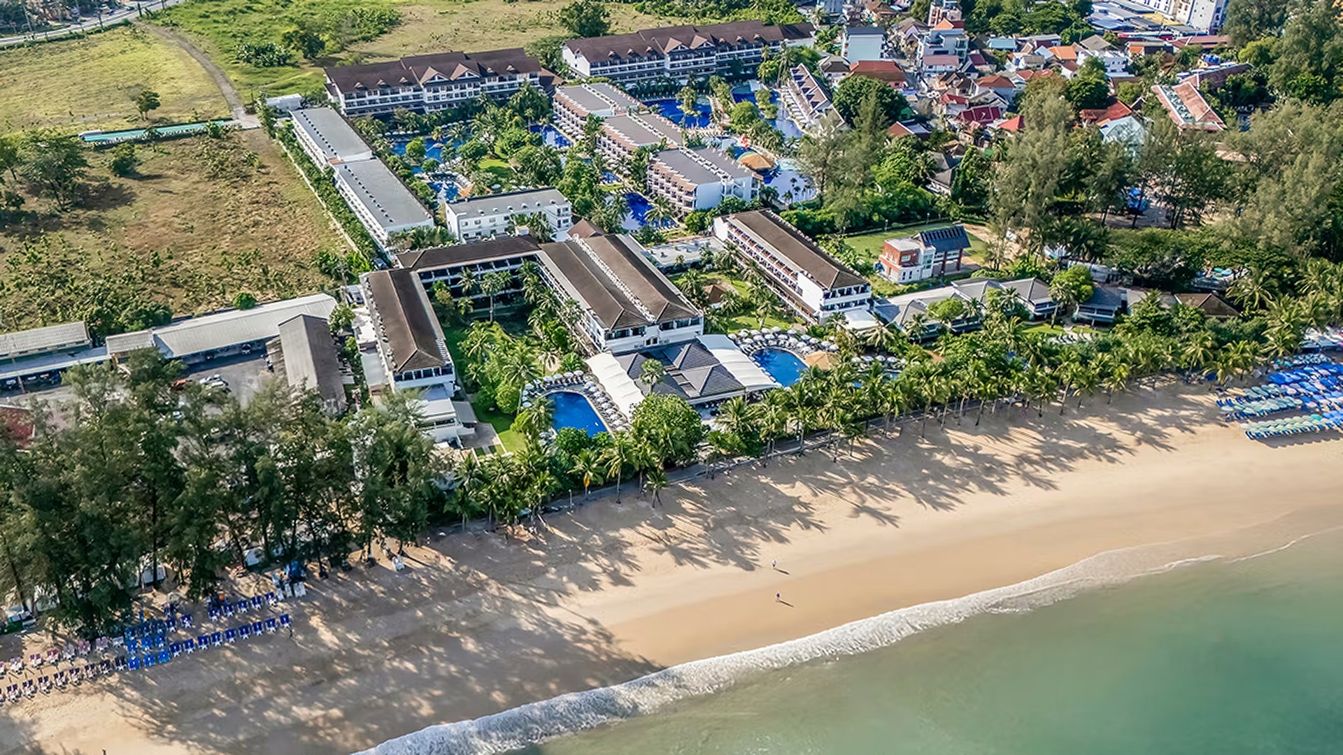 an aerial view of the Sunprime Kamala Beach resort located in Phuket, Thailand