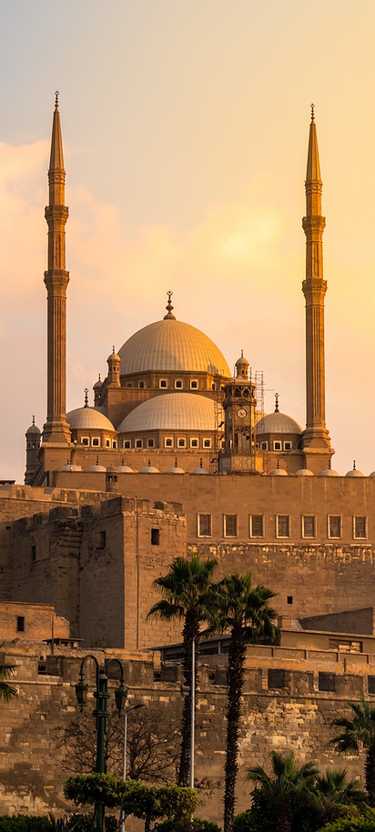the Mosque of Muhammad Ali located within the Cairo Citadel in Egypt at sunset