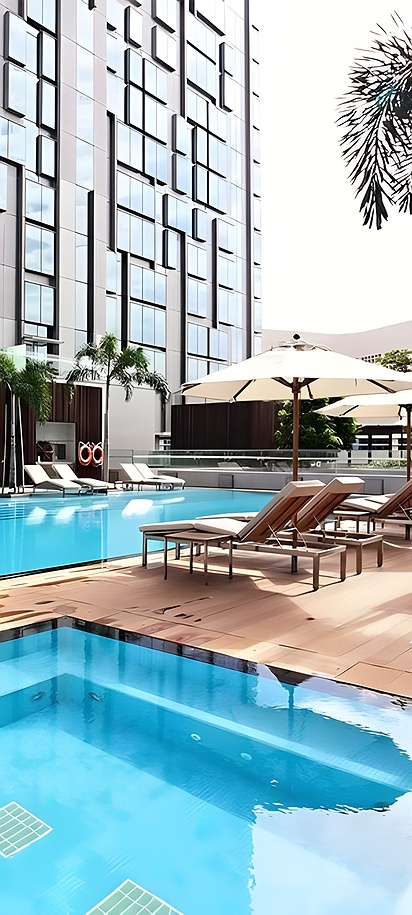 swimming pool area of the Oasia Hotel Novena in Singapore