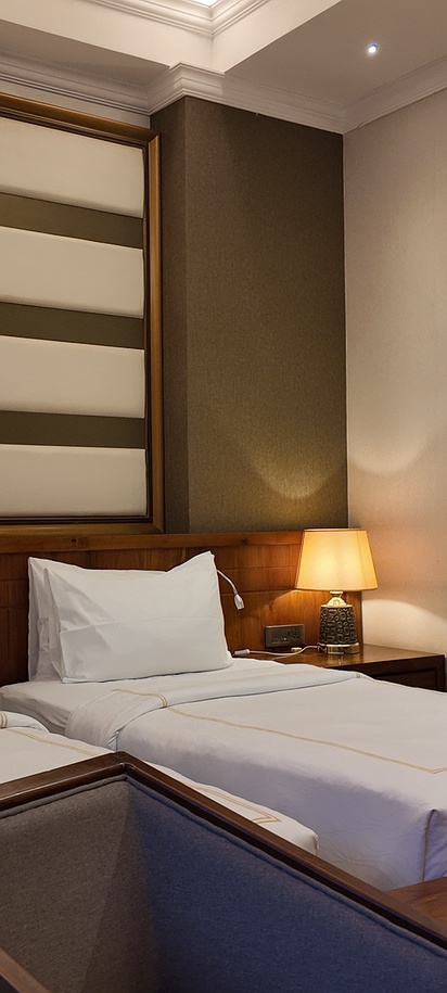 a bedroom at The Golden Crown Hotel in Ampitiya, Kandy.
