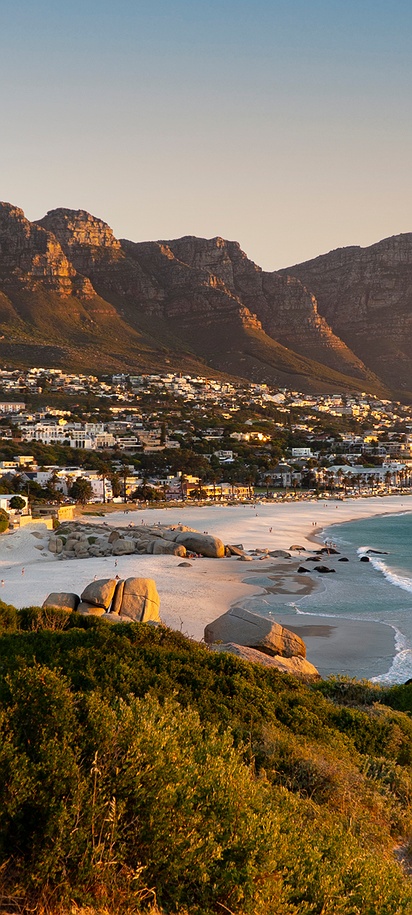 Camps Bay beach and the Twelve Apostles mountain range in Cape Town, South Africa