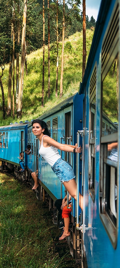 a scenic railway journey in Sri Lanka, likely the famous route between Kandy and Ella