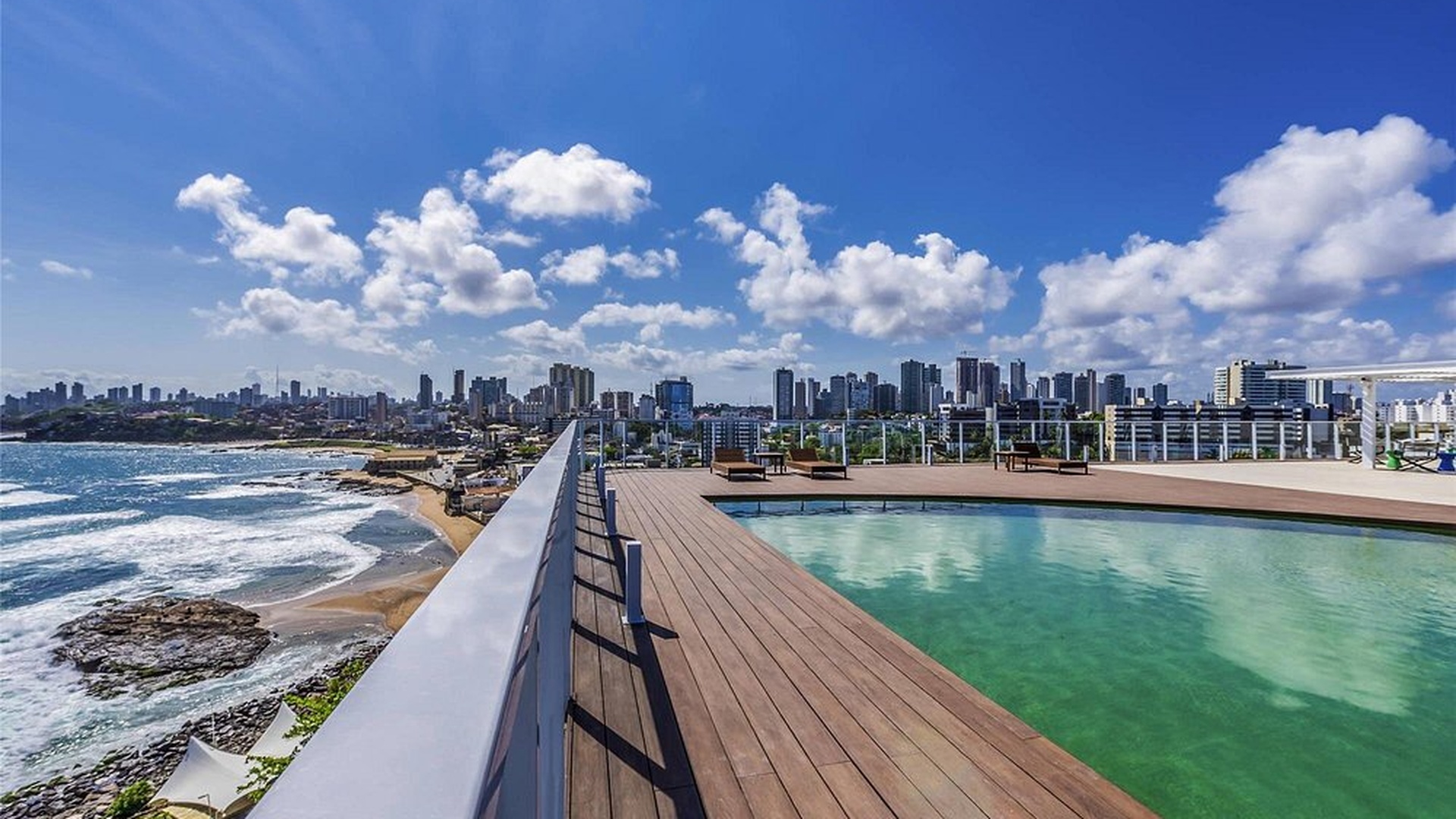the rooftop pool area of the Novotel Salvador Rio Vermelho hotel in Salvador, Brazil