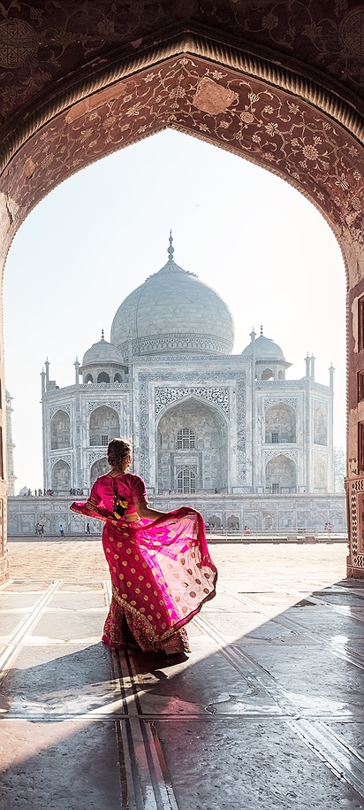 Woman in traditional dress at the Taj Mahal entrance