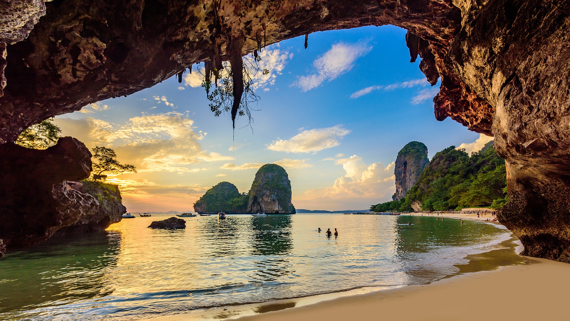 a scenic sunset view from a cave at Phra Nang Cave Beach in Krabi, Thailand
