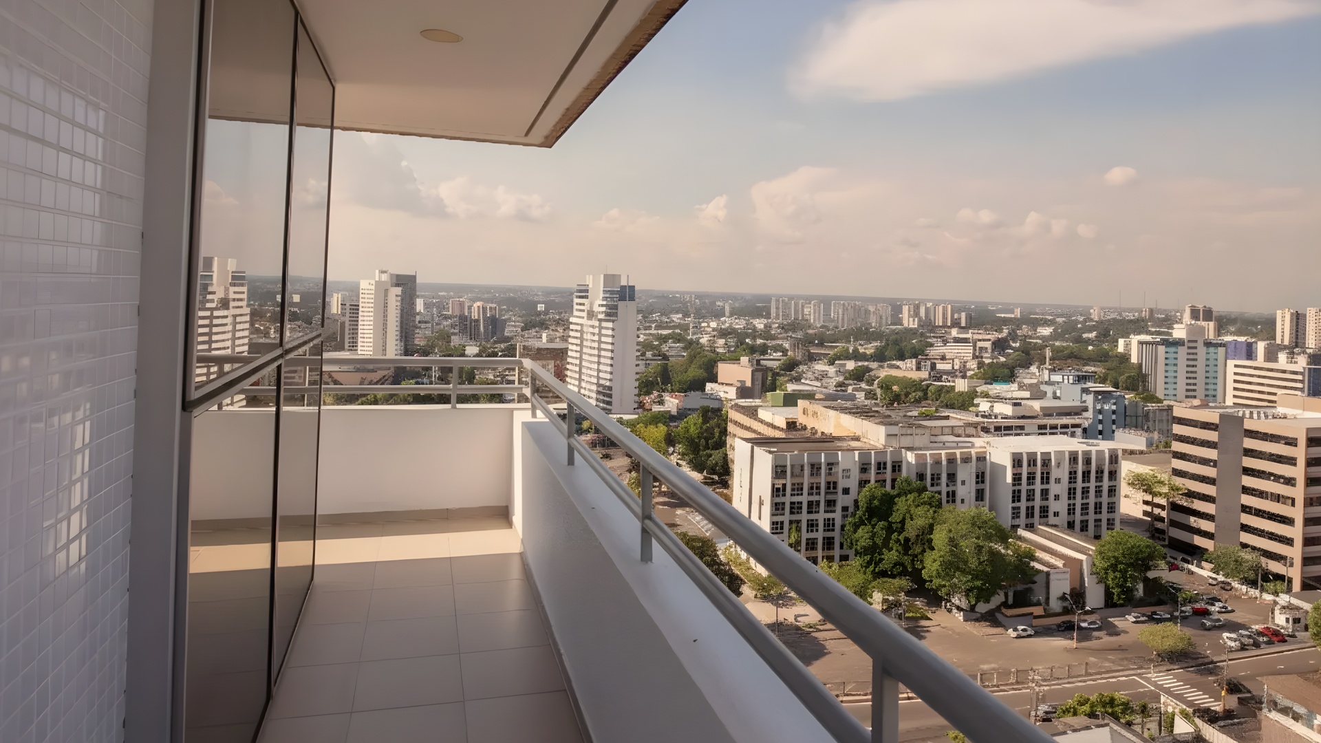 a view from an apartment balcony overlooking a city skyline