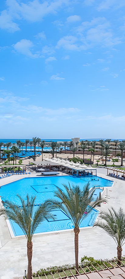 view of the pool and beach area at the Continental Hotel Hurghada in Egypt