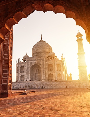 the Taj Mahal, a famous ivory-white marble mausoleum located in Agra, India