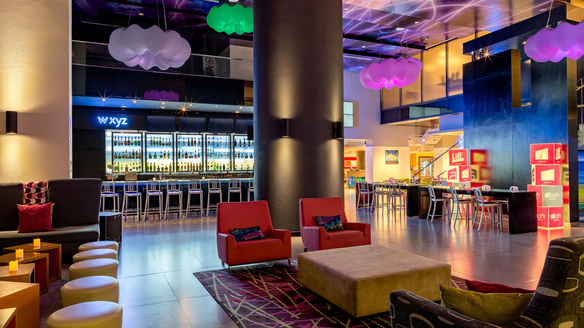 the lobby and bar area of the Aloft Panama hotel in Panama City