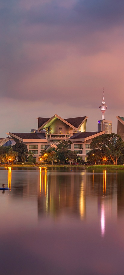a scenic view of the Kuala Lumpur skyline at dusk