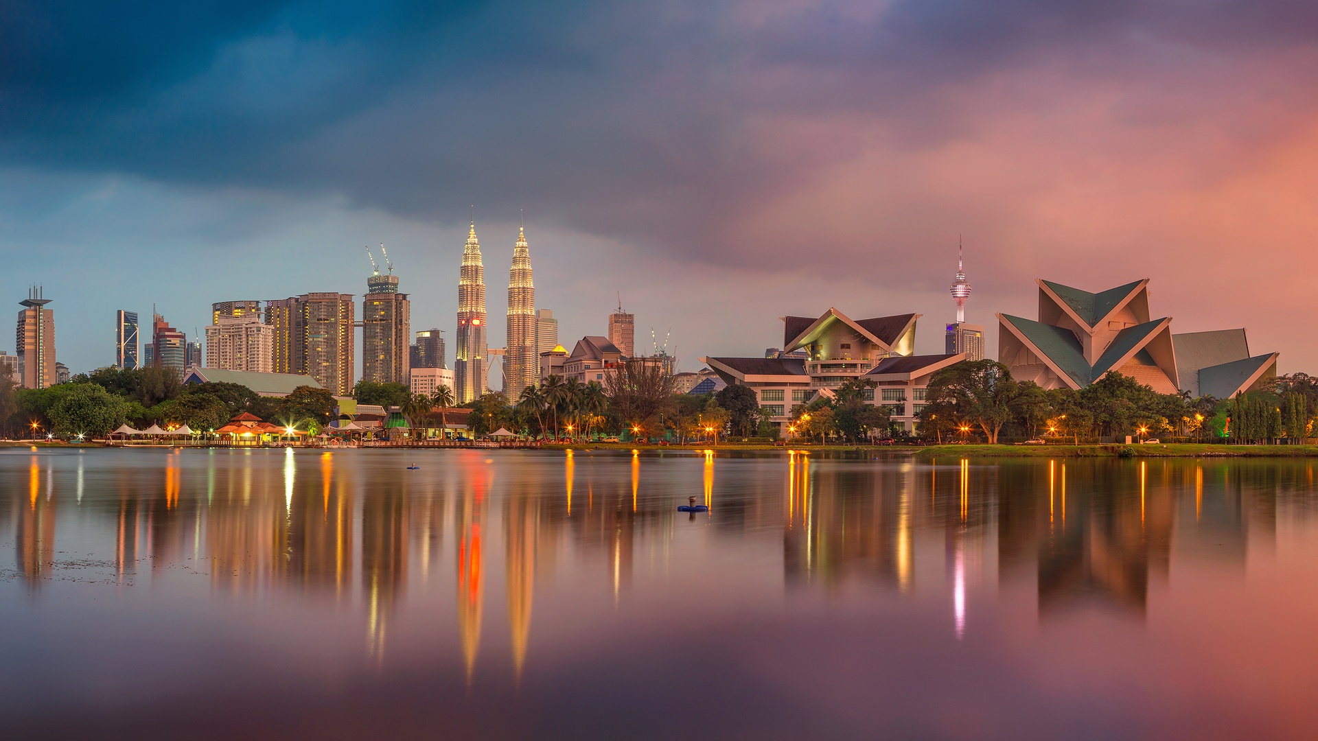  a scenic view of the Kuala Lumpur skyline at dusk