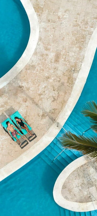the pool area at the Iberostar Waves Punta Cana resort in the Dominican Republic
