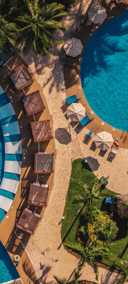 an aerial view of the swimming pools at the Jaz Makadi Saraya Resort in Makadi Bay, Egypt