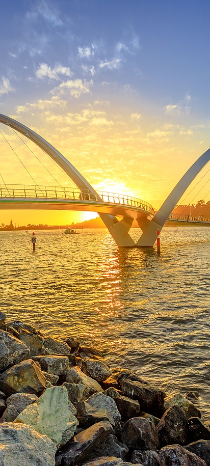 Sunset view of Elizabeth Quay Bridge in Perth, Australia