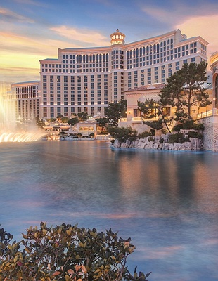 Exterior view with fountain show at Bellagio Hotel and Casino