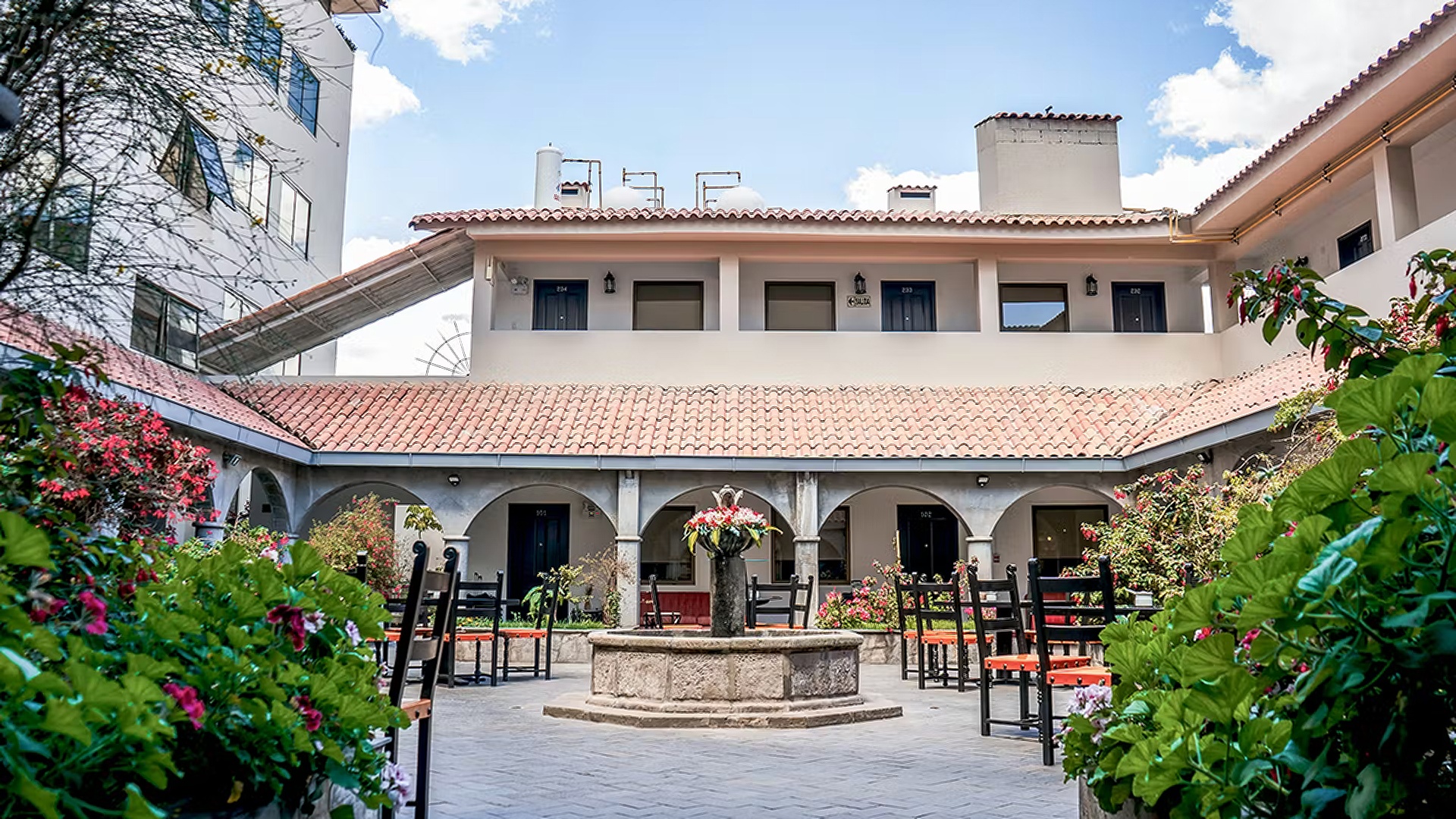 the central courtyard of the Hotel Jose Antonio Cusco, a 4-star hotel located in Cusco, Peru