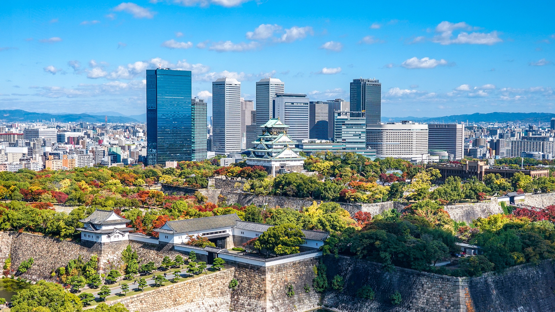 elevated view of Osaka Castle and the surrounding cityscape