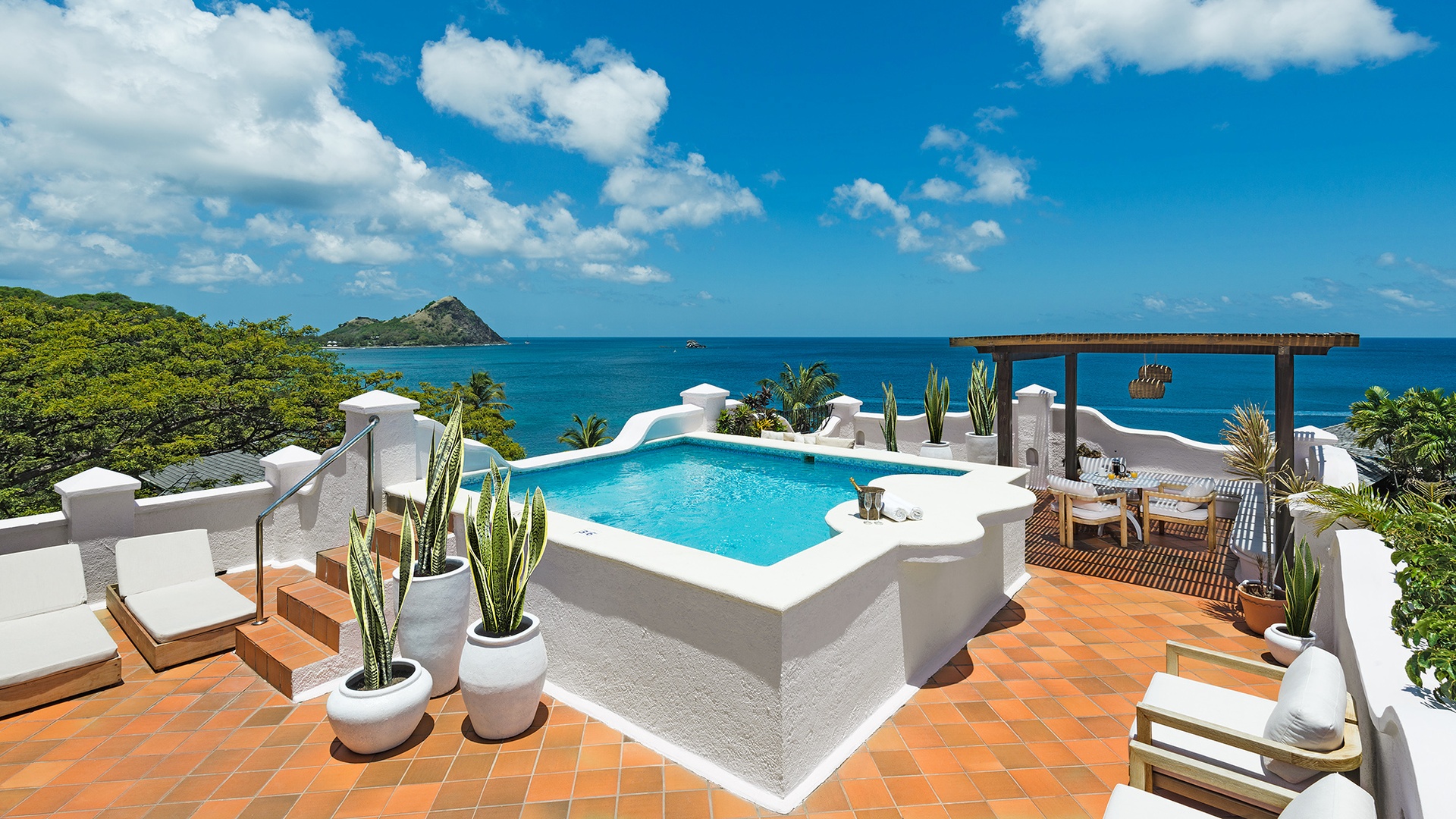 a rooftop terrace with a private swimming pool at the Cap Maison Resort & Spa in St. Lucia