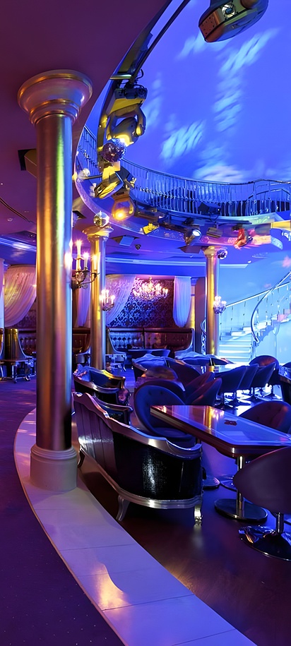 a lounge area at the Royal Tulip Almaty Hotel in Almaty, Kazakhstan