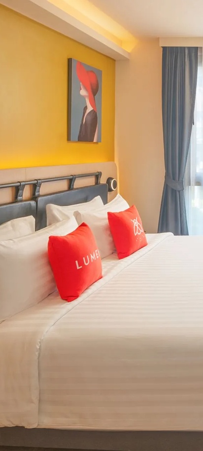 a guest room at the Lumen Bangkok Udomsuk Station hotel in Thailand
