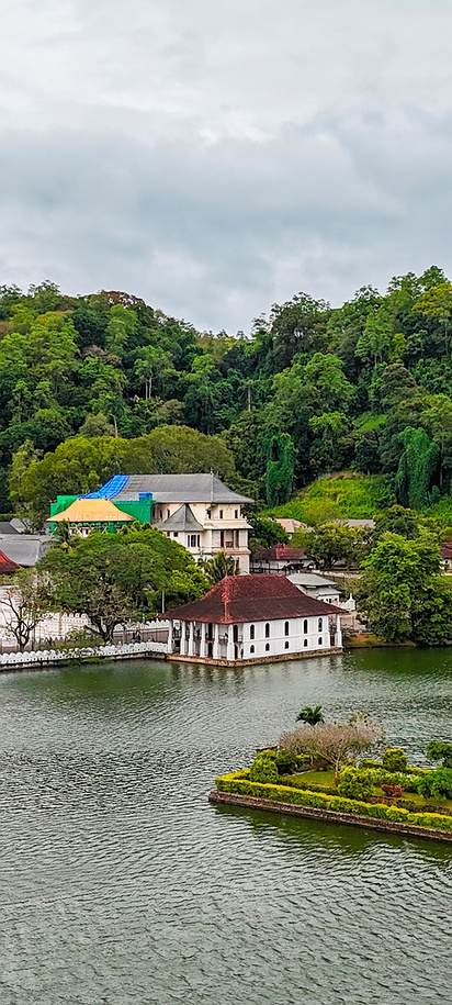 the Temple of the Sacred Tooth Relic (Sri Dalada Maligawa) located on the banks of Kandy Lake in Kandy, Sri Lanka