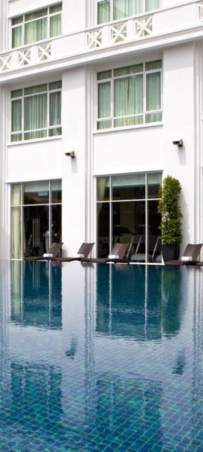 swimming pool area at the Majestic Hotel in Kuala Lumpur