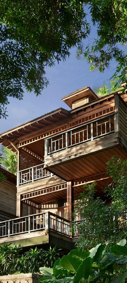 a wooden stilt villa at the Hilton Seychelles Northolme Resort & Spa