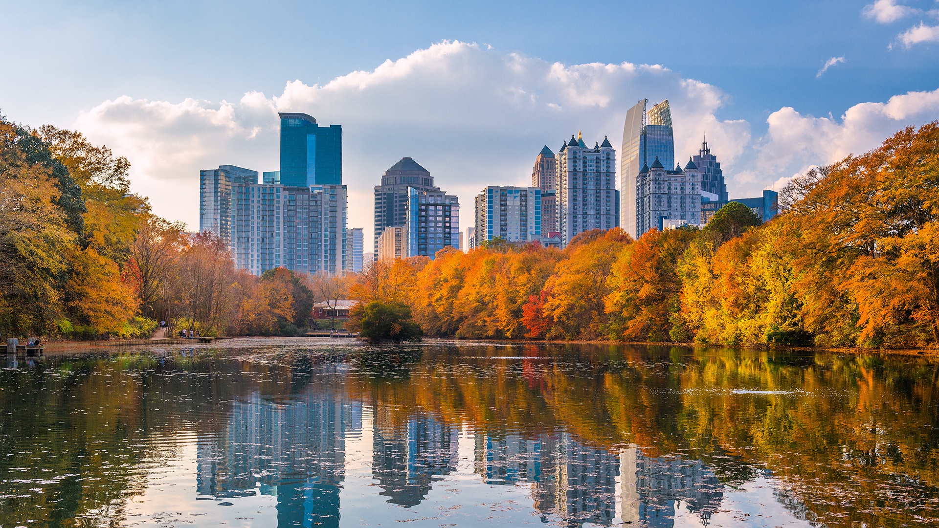 view of the Atlanta skyline as seen from Piedmont Park during the autumn season