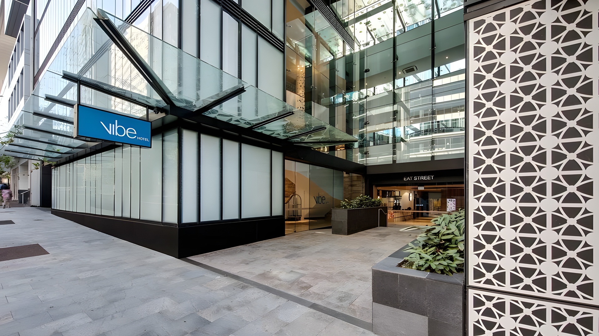 the exterior entrance of the Vibe Hotel North Sydney