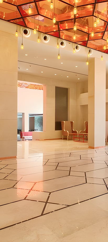 the lobby of the Sarovar Premiere Jaipur, a luxurious 5-star hotel located in the city of Jaipur, India