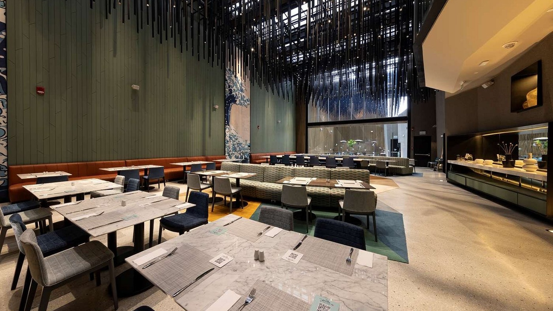the interior dining area of the Hilton Garden Inn Lima Miraflores hotel in Peru