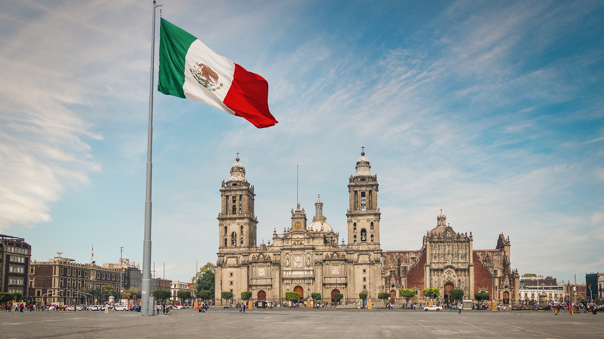 the Zócalo (Plaza de la Constitución), the main plaza in Mexico City, featuring the Metropolitan Cathedral and the Mexican flag