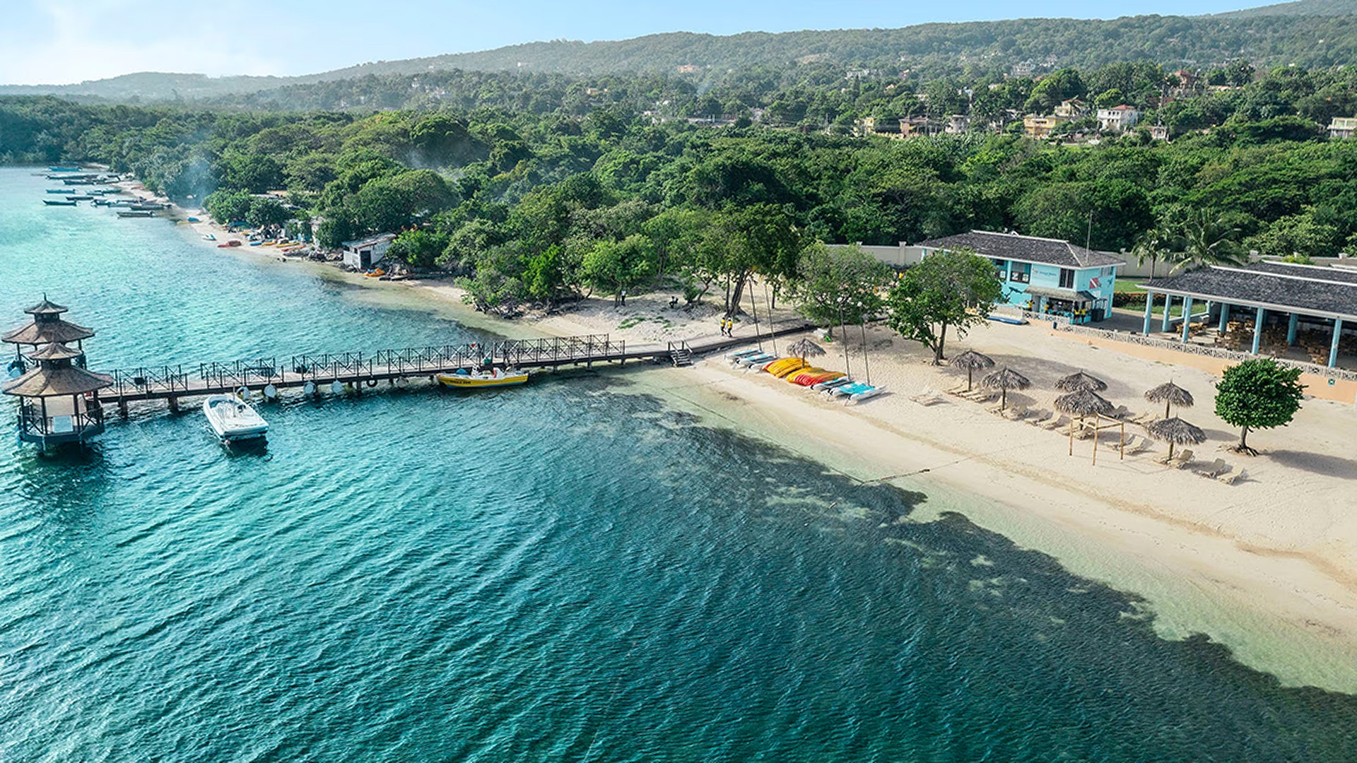 a scenic view of the Iberostar Waves Rose Hall Beach resort located in Montego Bay, Jamaica
