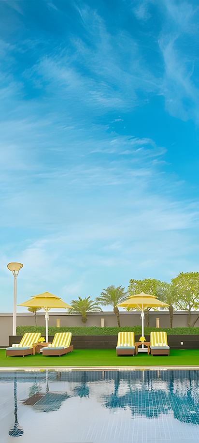 the rooftop swimming pool area of the La Marvella hotel in Bengaluru, India