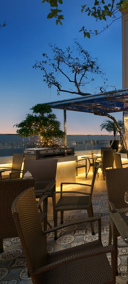 the rooftop restaurant and bar area of The Light Hotel, a 4-star hotel in Hanoi, Vietnam