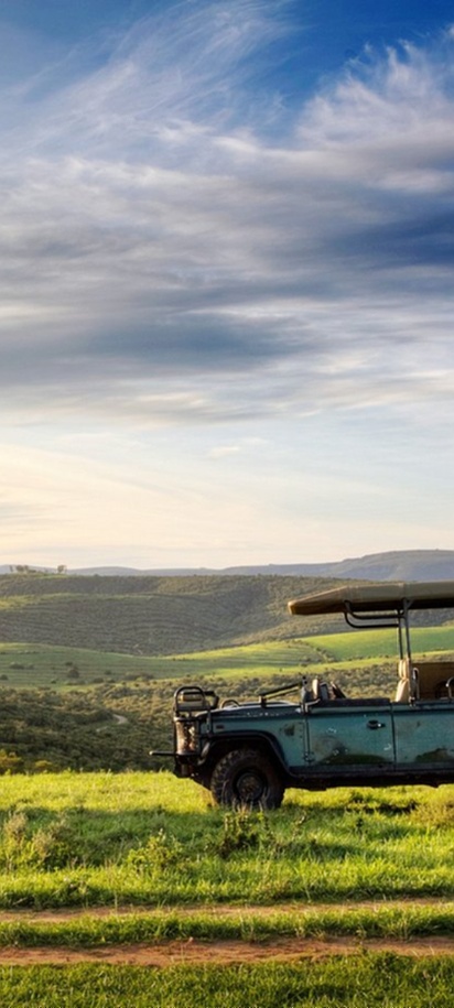 two safari vehicles at the Bellevue Forest Reserve in South Africa