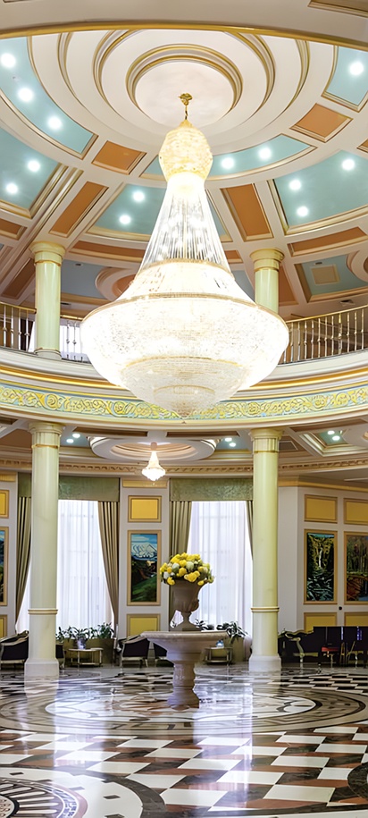 the lobby of the Royal Tulip Almaty, a 5-star luxury hotel located in Almaty, Kazakhstan