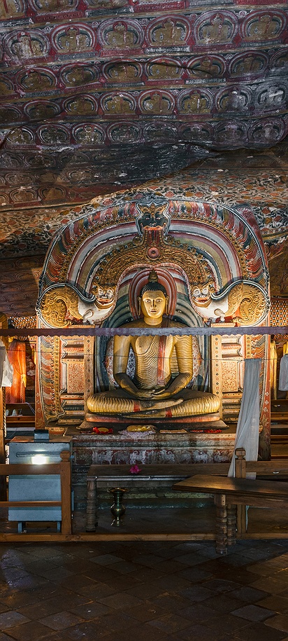 the interior of the Dambulla Cave Temple in Sri Lanka, specifically one of its historic shrine rooms