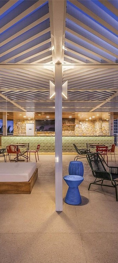 the rooftop bar and lounge area of the Novotel Salvador Rio Vermelho hotel in Brazil