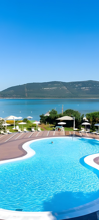 the swimming pool area at the Hotel Corte Rosada