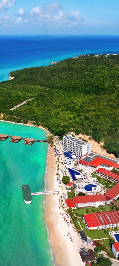 an aerial view of the Royalton CHIC Antigua, an adults-only all-inclusive resort situated on Dickenson Bay in Antigua