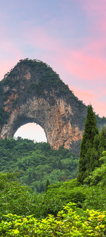 Moon Hill, a famous karst hill located near Yangshuo in Guangxi, China