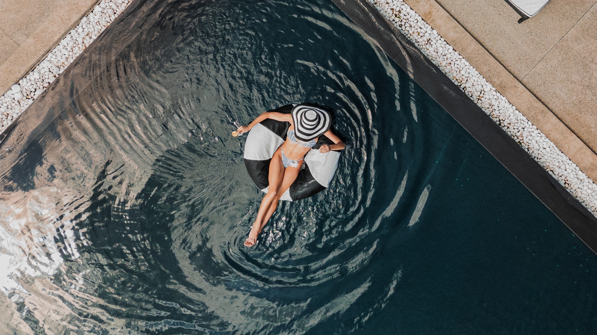 a luxury vacation moment in a swimming pool at the Sun Siyam Pasikudah resort in Sri Lanka